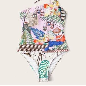 Amazing print!! 👏🏽Tie shoulder one piece